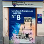 Graffiti en cierre de loterías de Segovia.