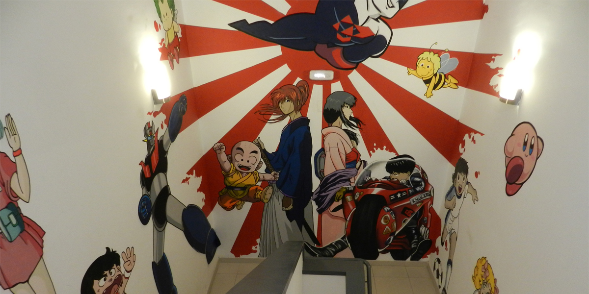 Graffiti de Kaneda, Kenshin y Krilin en oficina de Madrid.