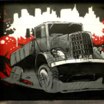 Graffiti de camión en puerta de garaje de Madrid