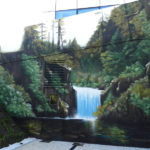 Mural de paisaje de cascada en Gijón