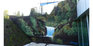 Mural de paisaje de cascada en Gijón