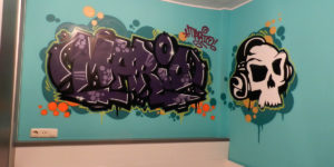Graffiti en habitación juvenil en Segovia